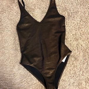 Gold body suit